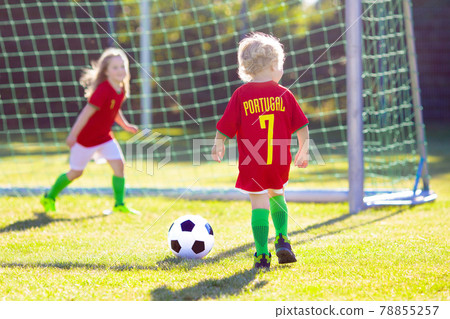 Portugal football fan kids. Children play soccer. 78855257