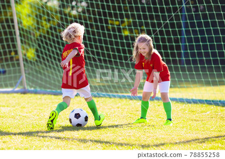 Portugal football fan kids. Children play soccer. 78855258