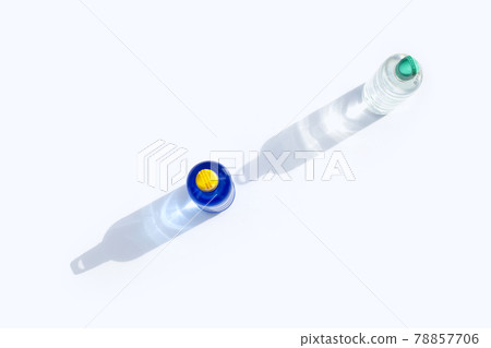 Plastic water bottles on white surface Plastic water bottles on white surface 78857706