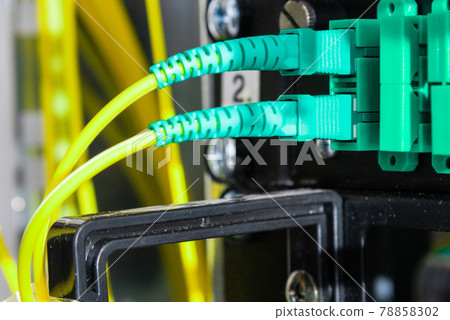 Fiber Optic cables connected to an optic ports Fiber Optic cables connected to an optic ports 78858302