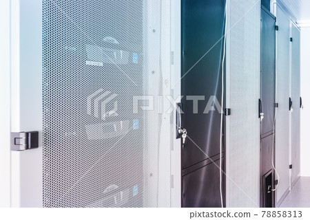 Server room with a row of server racks Server room with a row of server racks 78858313