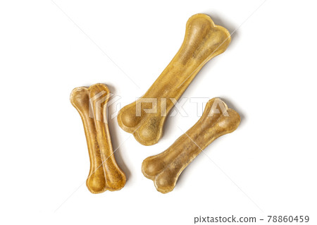 bone for dogs isolated on white background Top view Flat lay Delicious treat for your beloved pet Food for animals concept 78860459