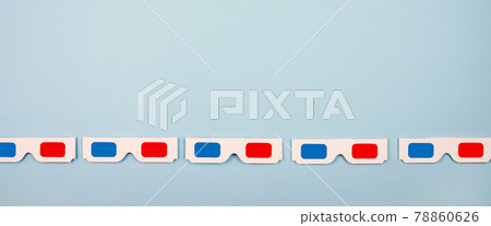 Banner with classic paper 3D glasses in a row on blue background. Banner with classic paper 3D glasses in a row on blue background. 78860626