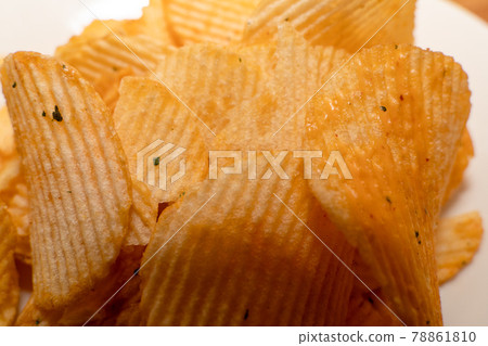 Potato chips snacks sweets junk food Potato chips snacks sweets junk food 78861810