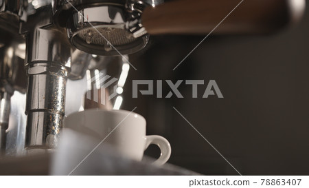 closeup of rinsing espresso coffee machine in the morning closeup of rinsing espresso coffee machine in the morning 78863407