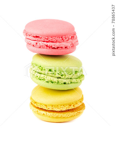 Fresh macaroons isolated on white background. Sweet and colourful french macaron. 78865437