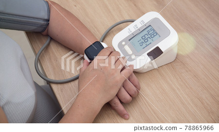 Female blood pressure.and heart rate with digital pressure gauge standard blood pressure test results .Health and Medical concept 78865966