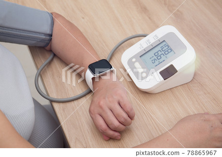 Female blood pressure.and heart rate with digital pressure gauge standard blood pressure test results .Health and Medical concept 78865967