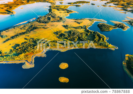 Braslaw Or Braslau, Vitebsk Voblast, Belarus. Aerial View Of Nedrava Lake And Green Forest Landscape In Sunny Autumn Morning. Top View Of Beautiful European Nature From High Attitude. Bird's Eye View Braslaw Or Braslau, Vitebsk Voblast, Belarus. Aerial View Of Nedrava Lake And Green Forest Landscape In Sunny Autumn Morning. Top View Of Beautiful European Nature From High Attitude. Bird's Eye View 78867888