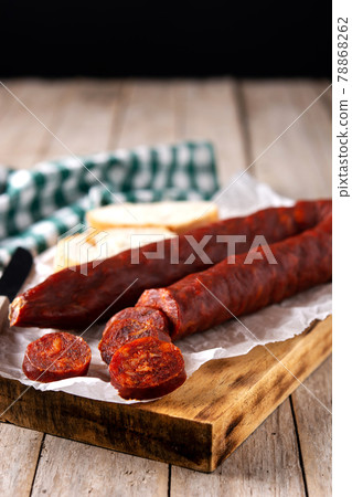 Spanish chorizo sausage on rustic 78868262