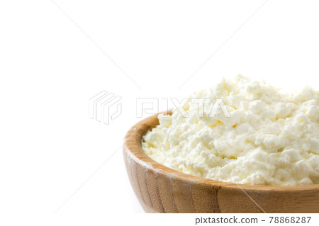 Fresh cottage cheese in a metal bowl Fresh cottage cheese in a metal bowl 78868287