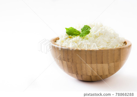 Fresh cottage cheese in a metal bowl Fresh cottage cheese in a metal bowl 78868288