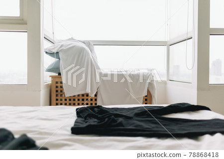Clothes hanging on the table let dry on the balcony of an apartment. 78868418