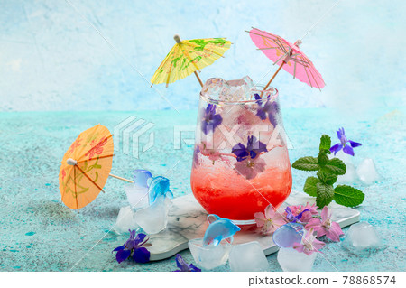 Lemonade with fresh strawberries and flowers. 78868574