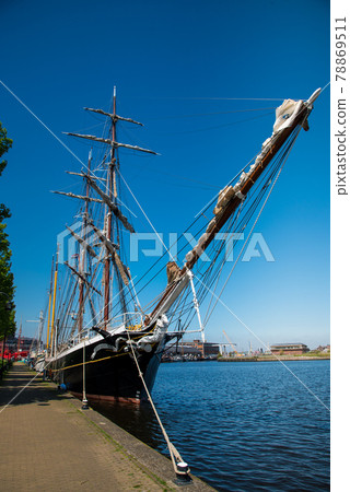 Den Helder, the Netherlands. May 5, 2021. Old clipper moored at the quay of the former shipyard Willemsoord in Den Helder, the netherlands. 78869511