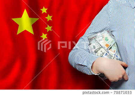 American dollars cash money in hand on national Chinese flag background American dollars cash money in hand on national Chinese flag background 78871033