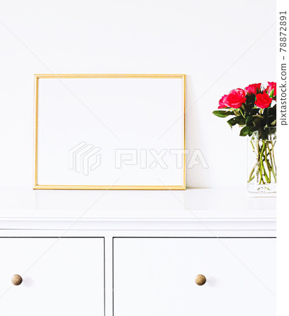 Golden frame on white furniture, luxury home decor and design for mockup, poster print and printable art, online shop showcase 78872891