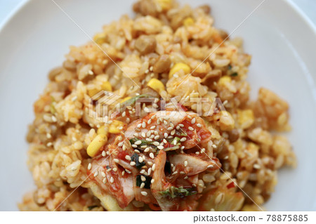 Natto and kimchi fried rice made with pressed barley and rice 78875885
