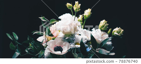 Flower bouquet on black background, beautiful floral arrangement, creative flowers and floristic design idea Flower bouquet on black background, beautiful floral arrangement, creative flowers and floristic design idea 78876740