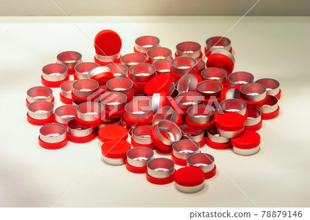 New pharmaceutical caps, metal and plastic, close-up view New pharmaceutical caps, metal and plastic, close-up view 78879146