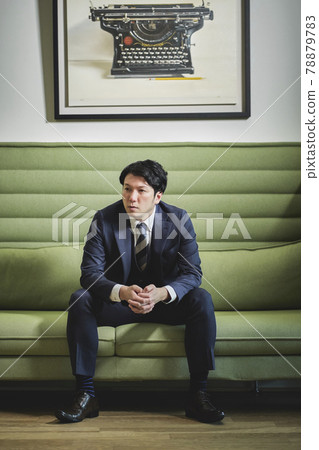 Men's portrait in a suit 78879783