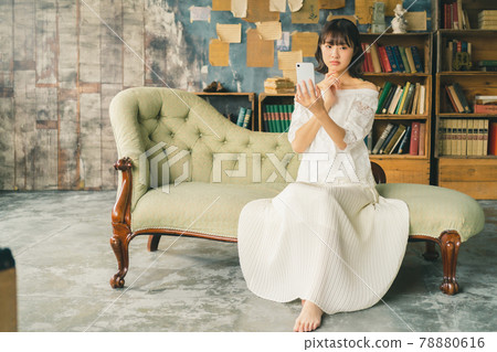 Late teenage girls and smartphones 78880616