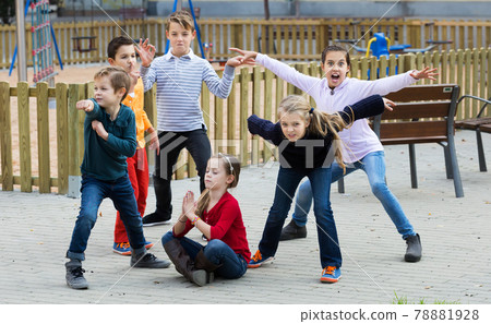 Active kids playing outdoors 78881928