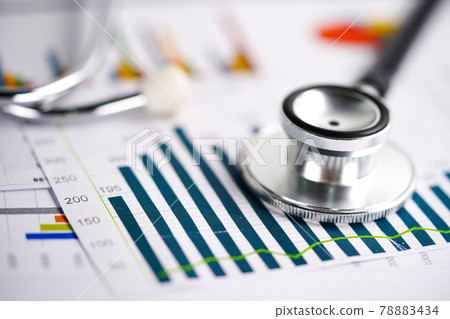 Stethoscope, Charts and Graphs spreadsheet paper, Finance, Account, Statistics, Investment, Analytic research data economy spreadsheet and Business company concept.. 78883434