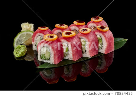 Philadelphia rolls with tuna, kumquat and unagi sauce Philadelphia rolls with tuna, kumquat and unagi sauce 78884455