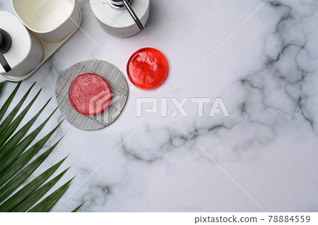 Handmade organic soap and shampoo bottle on marble background. Handmade organic soap and shampoo bottle on marble background. 78884559