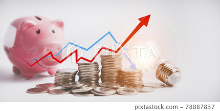 Coins stack and Happy Piggy  Bank  with line graph  business connect on white background, Saving  ideas and  investment budget, Business saving money concept, Copy space 78887837