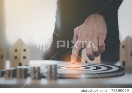 Targeting the new business concept, Businessman use fingers touch dart to virtual target dart board,Executive marketing, investment goal and target for business investment. 78890029