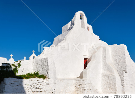 Iconic tourist landmark, Mykonos, Greece. White Greek Orthodox church of Panagia Paraportiani, town of Chora on island at sunrise. Iconic destination Iconic tourist landmark, Mykonos, Greece. White Greek Orthodox church of Panagia Paraportiani, town of Chora on island at sunrise. Iconic destination 78893255