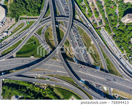 Busy multilevel junction in summer in outskirts Busy multilevel junction in summer in outskirts 78894413