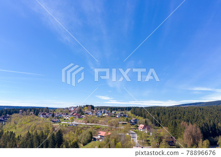 Aerial view of a village in the Harz mountains lying on a plateau 78896676