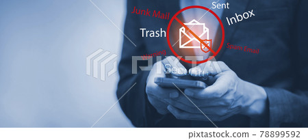 Email concept with laptop spam and virus computer monitor internet security concept, businessman reading electronic mail with a laptop. Spam, junk and e-marketing on screen, Spam Email Pop-up Warning. Email concept with laptop spam and virus computer monitor internet security concept, businessman reading electronic mail with a laptop. Spam, junk and e-marketing on screen, Spam Email Pop-up Warning. 78899592