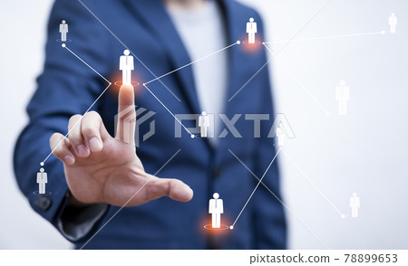 Businessman holding HR Human ,people icon on the graph Screen of a media screen, Technology Process System Business with Recruitment, Hiring, Team Building. Organisation structure concept. Businessman holding HR Human ,people icon on the graph Screen of a media screen, Technology Process System Business with Recruitment, Hiring, Team Building. Organisation structure concept. 78899653