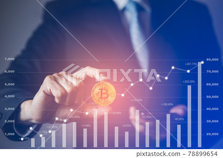 Businessman Hand holding Bitcoin New virtual money coin over us dollars close up, Digital Money and Bitcoin Concept. Cryptocurrency golden coin, stock exchange graph background. Digital money concept. Businessman Hand holding Bitcoin New virtual money coin over us dollars close up, Digital Money and Bitcoin Concept. Cryptocurrency golden coin, stock exchange graph background. Digital money concept. 78899654