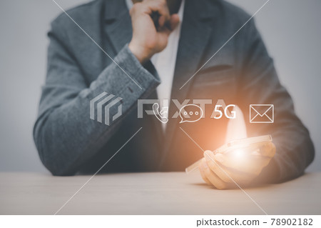 Close-up image of male hands using smartphone with icon, Customer support hotline Contact us people connection. Businessman using Smart Phone with the email, call phone, address, Chat message icons. 78902182