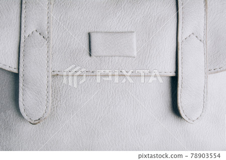 Gray leather texture with stitching. Textured background 78903554