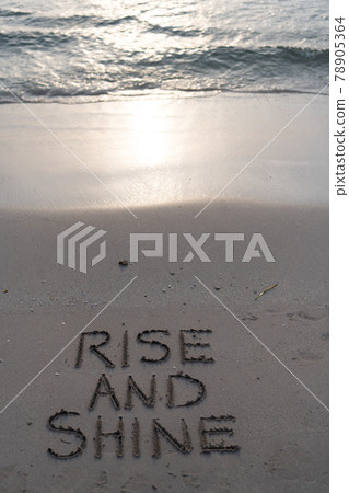rise and shine on sand beach in sunrise at ocean or sea water waves, rise and shine 78905364