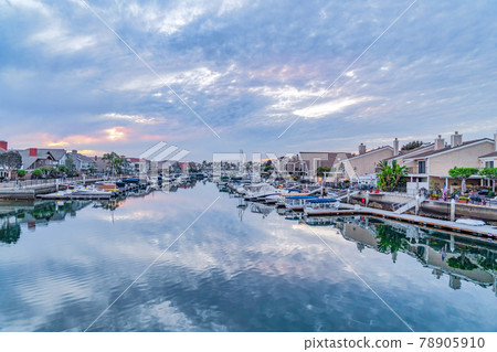 Brilliant landscape of a seaside neighborhood in Huntington Beach CA at sunset Brilliant landscape of a seaside neighborhood in Huntington Beach CA at sunset 78905910