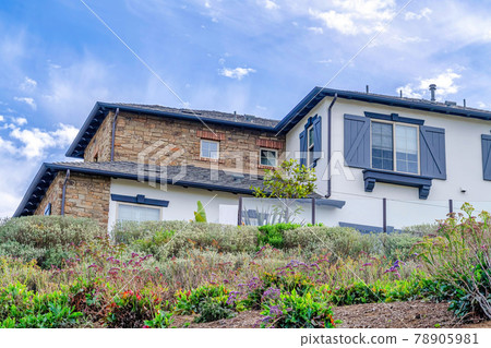 House on a slope at the seaside neighborhood of Huntington Beach California House on a slope at the seaside neighborhood of Huntington Beach California 78905981
