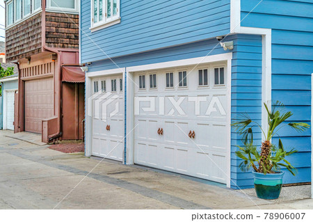 Exterior view of houses in Long Beach California featuring attached garages Exterior view of houses in Long Beach California featuring attached garages 78906007
