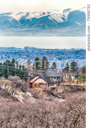 Houses against Provo Canyon Utah landscape of lake and mountains in winter 78906782