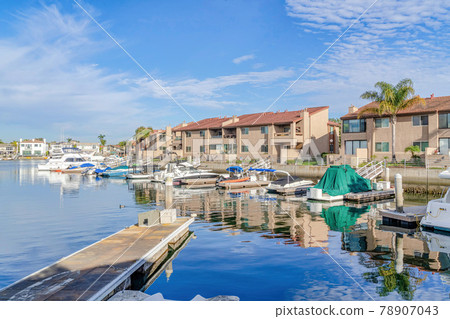 Beautiful harbour views with boats and docks in Huntington Beach California Beautiful harbour views with boats and docks in Huntington Beach California 78907043