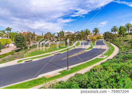 Roads and lush foliage on Huntington Beach California neighborhood landscape Roads and lush foliage on Huntington Beach California neighborhood landscape 78907204