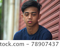 A Tired  Filipino Teenage Boy 78907437