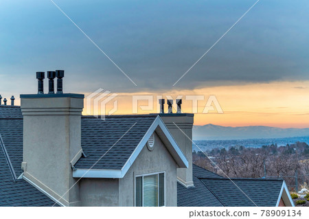 Scenic Provo Canyon Utah landscape with rooftop in the foreground at sunset 78909134