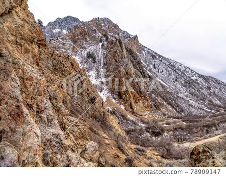 Magnificent rocky mountain in Provo Canyon Utah dusted with snow in winter Magnificent rocky mountain in Provo Canyon Utah dusted with snow in winter 78909147